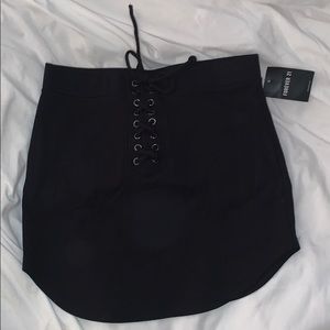black cotton mini skirt w/ lace up front